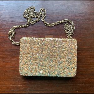 Gold sequin clutch purse or shoulder strap.